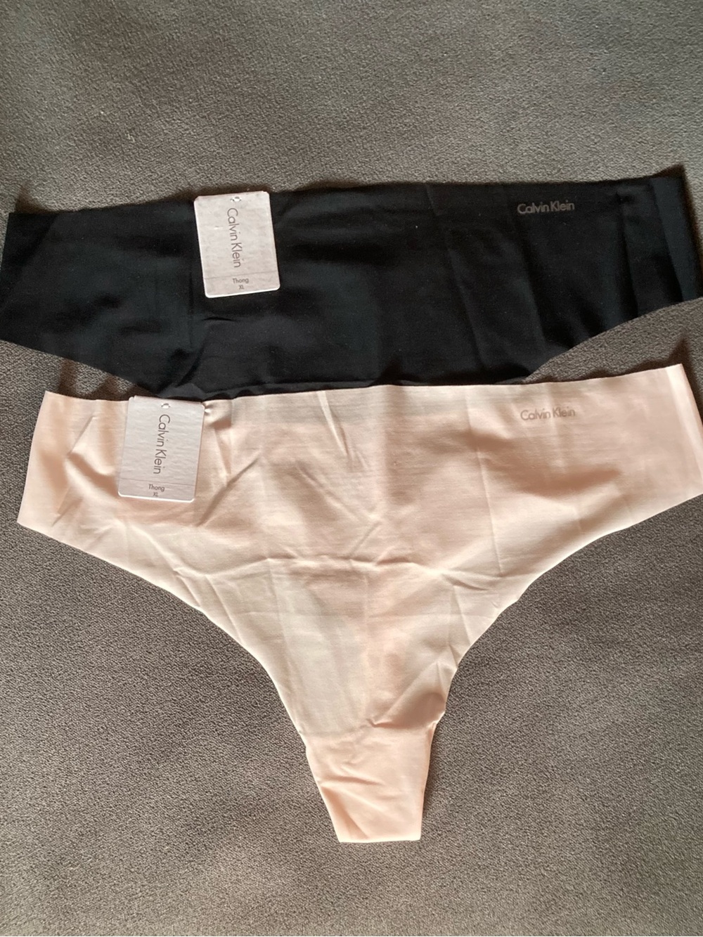 Calvin Klein Women’s XL Seamless Invisibles Thongs - Black & Light Pink